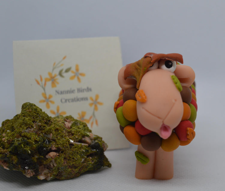 Welcome to the Whimsy Wool Flock, a joyful gathering of hand-sculpted polymer clay sheep each bursting with colour, personality, an a little touch of mischief.