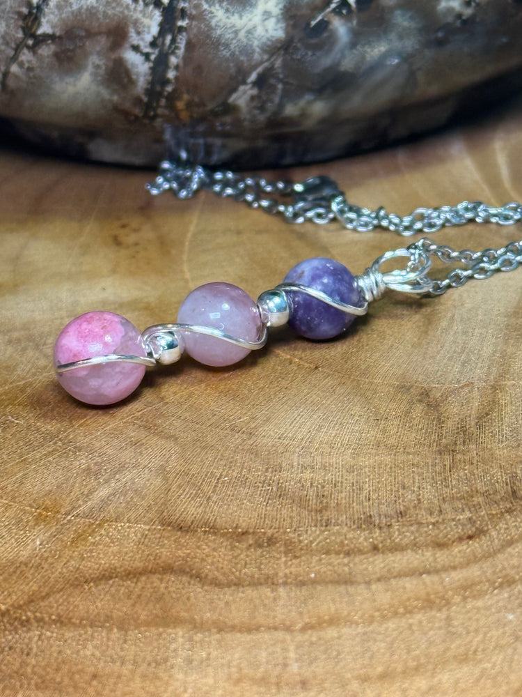 Discover the&nbsp;Trinity Pendants, a collection of three stone crystal talismans designed to align your mind, heart, and spirit.